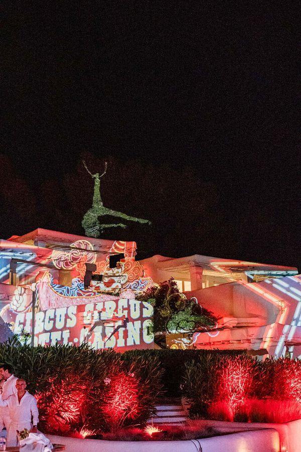 Dramatic architectural lighting at an outdoor event venue in Ibiza